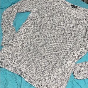 Sweater with criss cross design